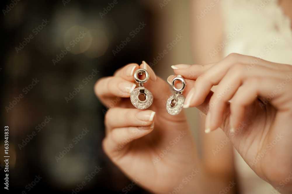 Bride and earrings. Beautiful jewelry for the bride Bride and earrings. Beautiful jewelry for the bride
