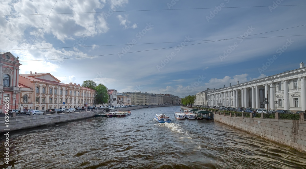 River channel with boats in Saint-Petersburg RUSSIA River channel with boats in Saint-Petersburg RUSSIA