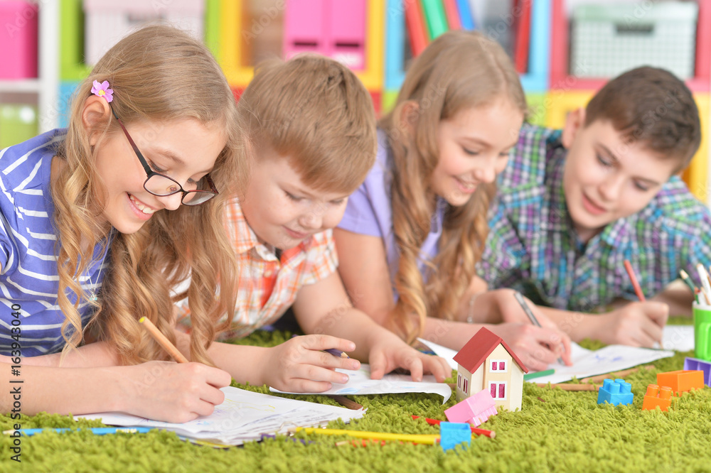 Fototapeta premium Group of children drawing with pencils