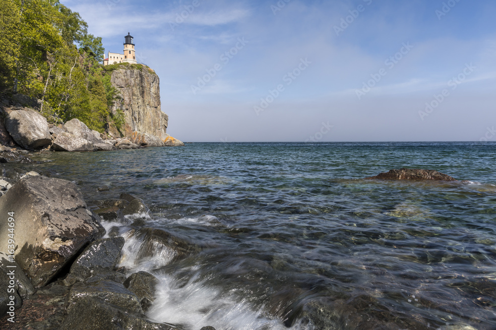 Split Rock Lighthouse / A lighthouse on a cliff along Lake Superior.