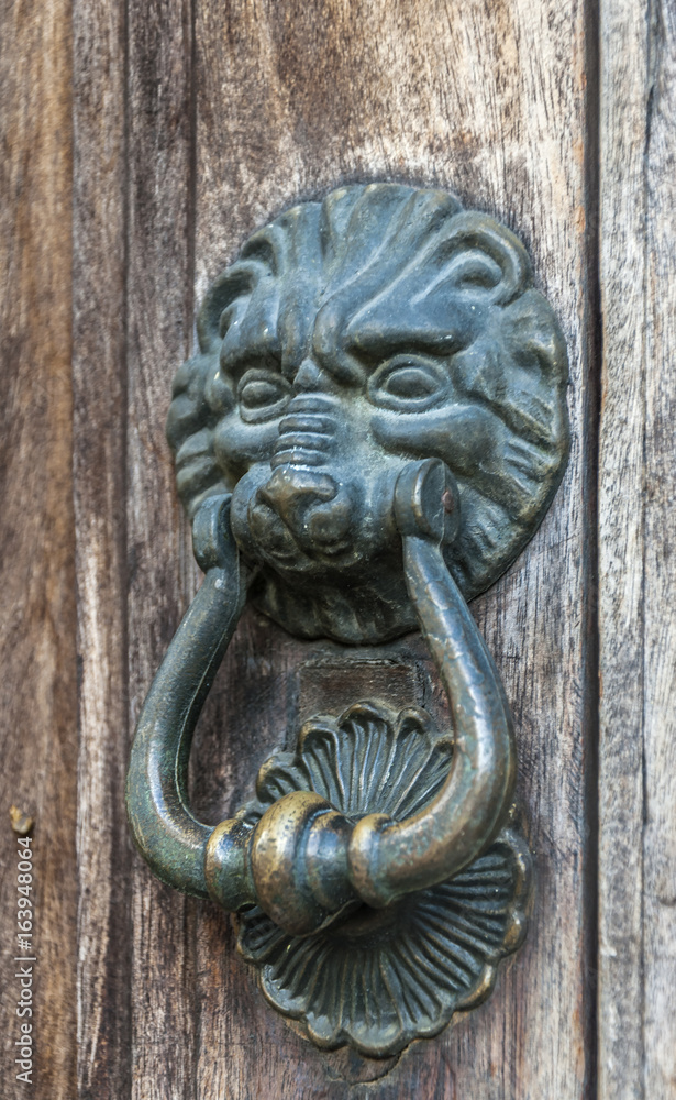 Metal knocker old door Antigua Guatemala wooden