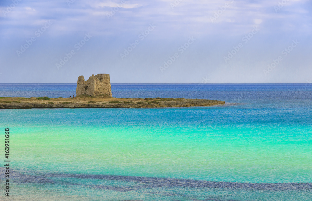 Sea colors. Apulia coast (Italy): Marina di Lizzano beach,Torre Sgarrata watchtower.It's characterized by a alternation of sandy coves and jagged cliffs overlooking a truly clear and crystalline sea.