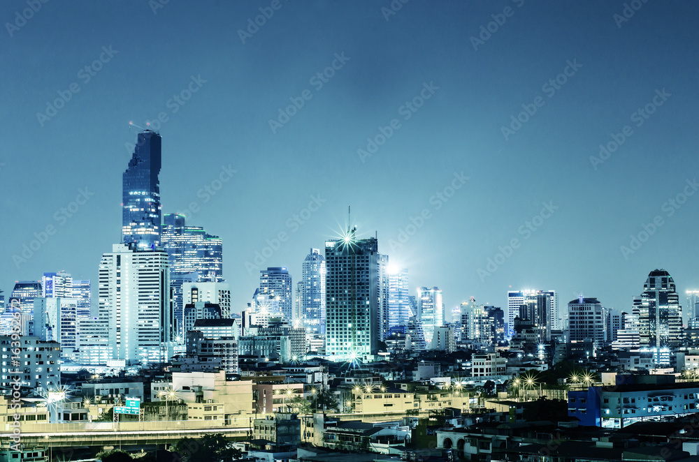 Landscape Bangkok city Modern building at twilight, high angle.