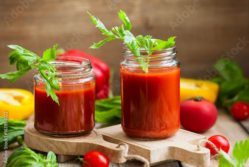 Spicy tomato drink in jars