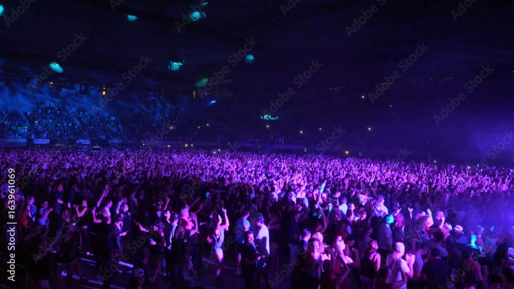 View of multi-purpose pavilion with thousands of people entering View of multi-purpose pavilion with thousands of people entering