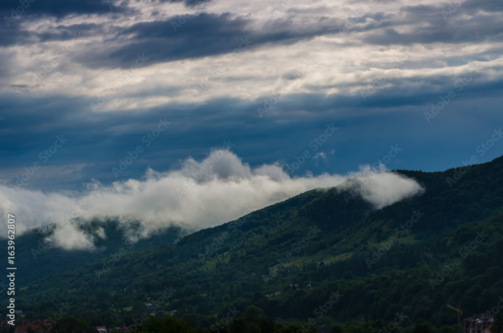 Ukrainian carpathian mountaine landscape with fog