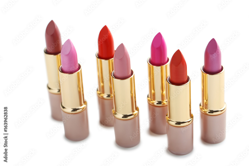 Obraz premium Colorful lipsticks isolated on a white