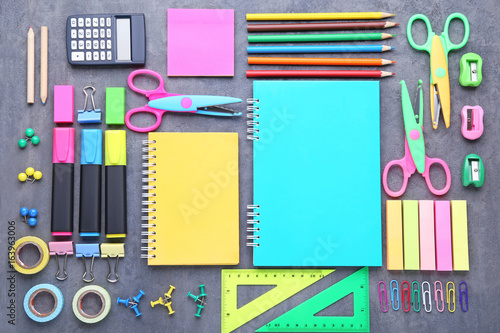 School supplies on grey wooden table