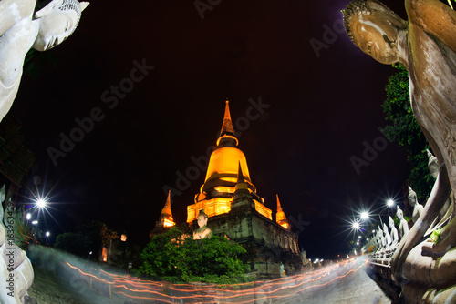 Triple circumambulation at Wat Yai Chai Mongkhol temple in Asanha Bucha Day in Thailand. photo