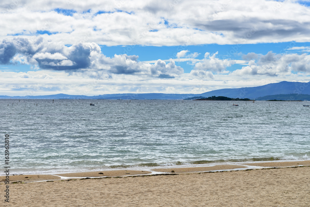 view of the ocean and a blue sky with clouds