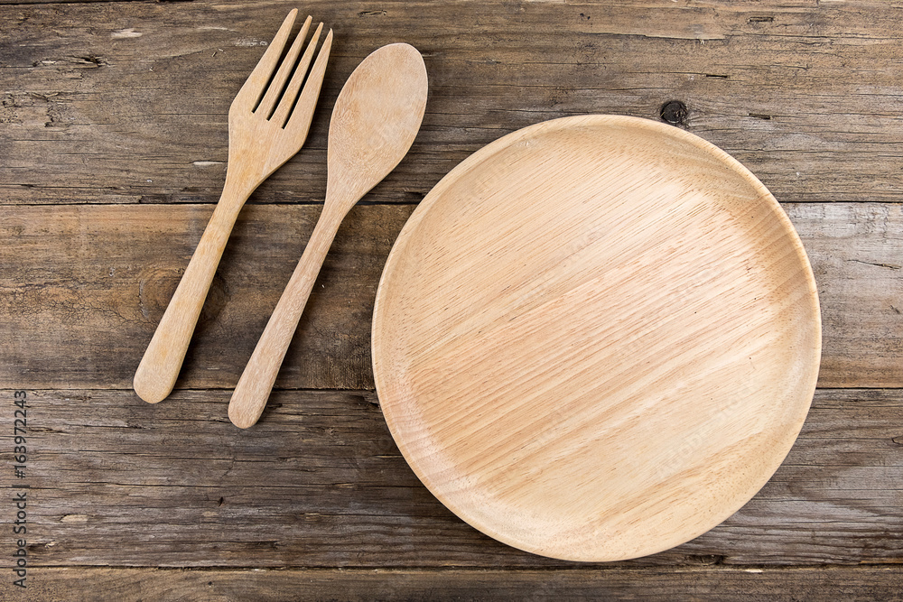 Wooden utensil kitchen on wooden table background Wooden utensil kitchen on wooden table background