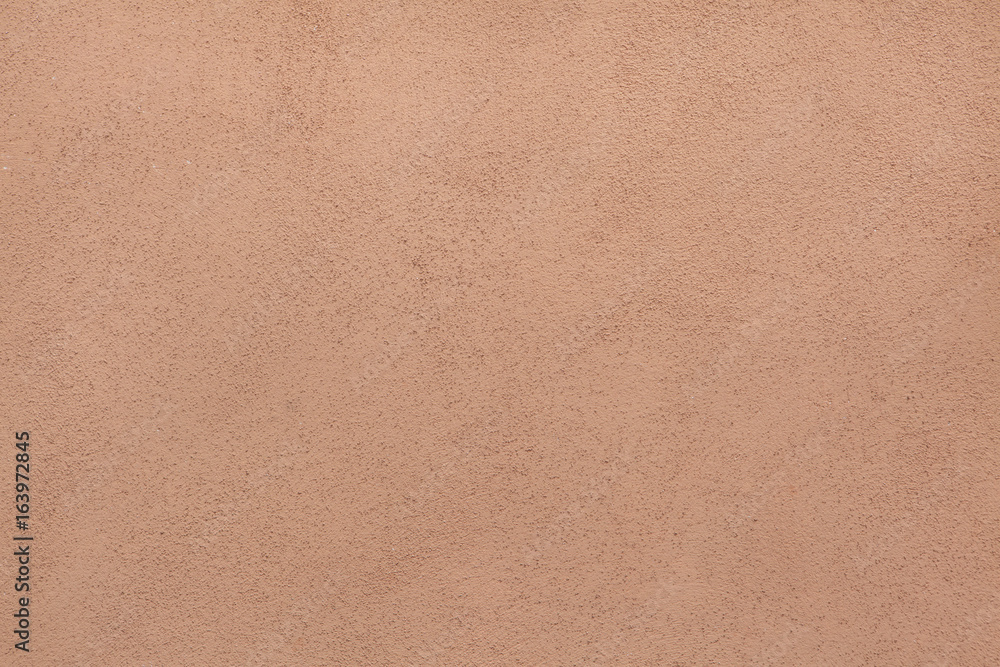 Brown painted stucco wall. Background texture Brown painted stucco wall. Background texture