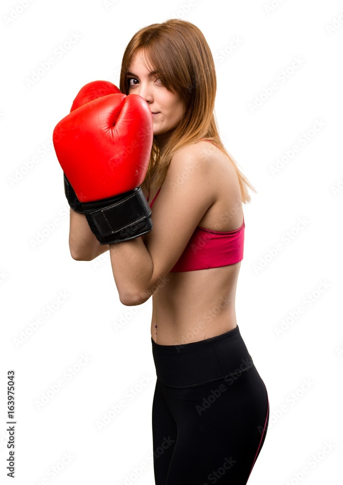 Young sport woman with boxing gloves Young sport woman with boxing gloves