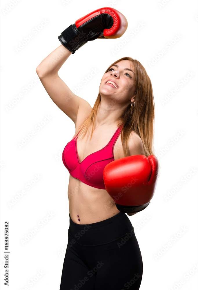 Young sport woman with boxing gloves Young sport woman with boxing gloves