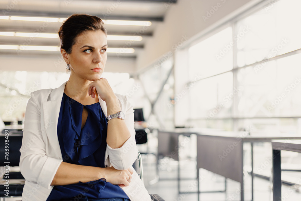 Beautiful businesswoman at the co-working Beautiful businesswoman at the co-working
