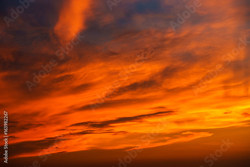 Sunset makes the sky and cloud  a beautiful golden yellow. © MAGNIFIER