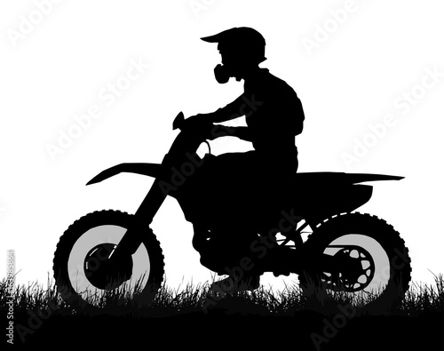 Side profile silhouette of off road biker with scrambler