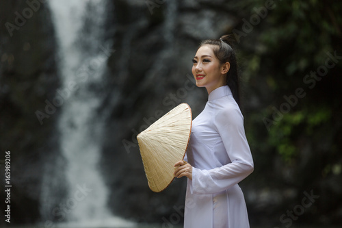 Women, wearing Vietnam national dress, photo