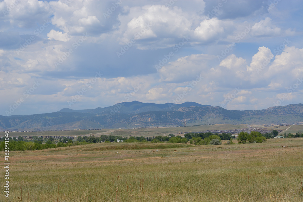 View of Rocky Mountain foothills and Front Range prairie from Standley Lake Regional Park in Westminster Colorado