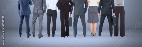 Group of Business People standing with blue vignette background