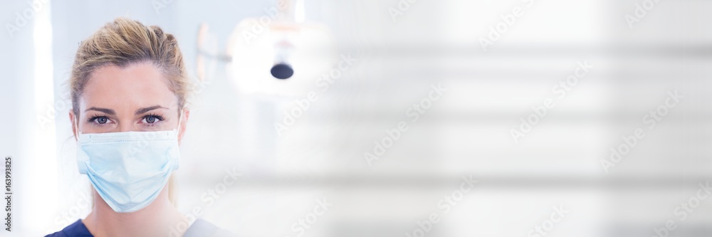 Dentist with mask and blurry white transition Dentist with mask and blurry white transition