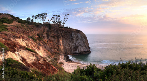 Sunset over the farthest south end of Crystal Cove beach photo