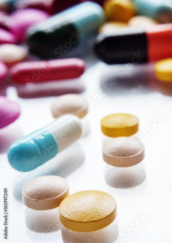 Closeup of various medical pills pharmaceutical