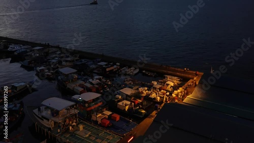 Time Lapse Top view boat and sunset in Male, Maldives photo