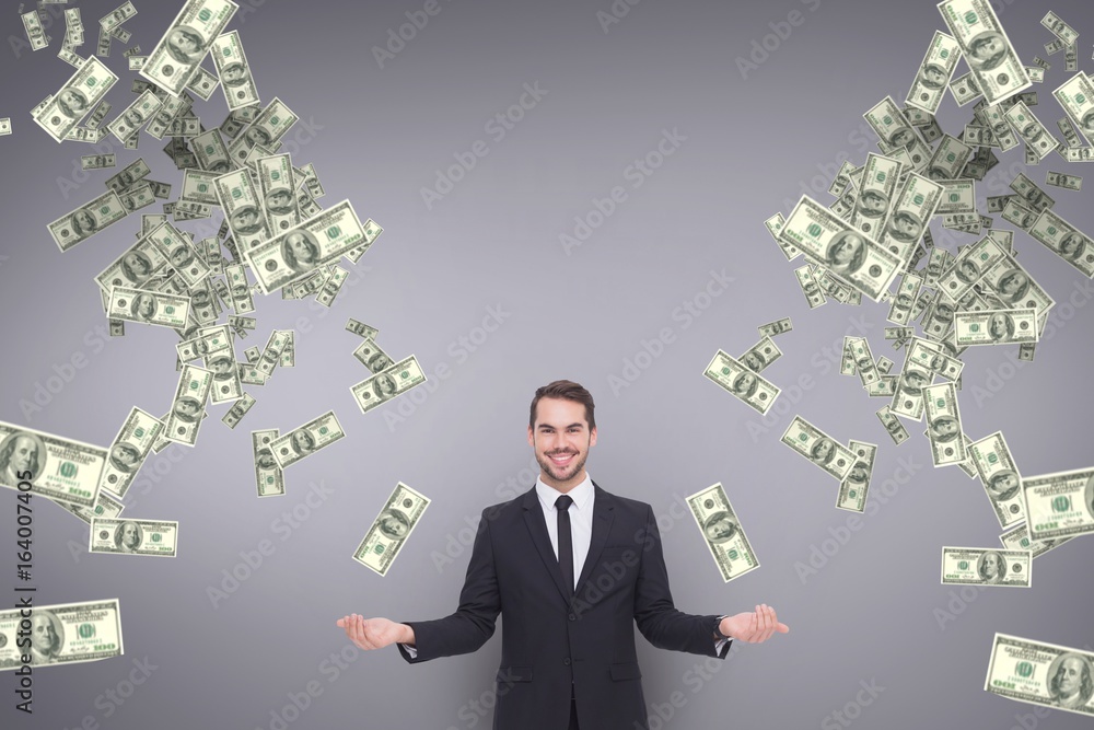 Happy business man with money rain against purple background Happy business man with money rain against purple background