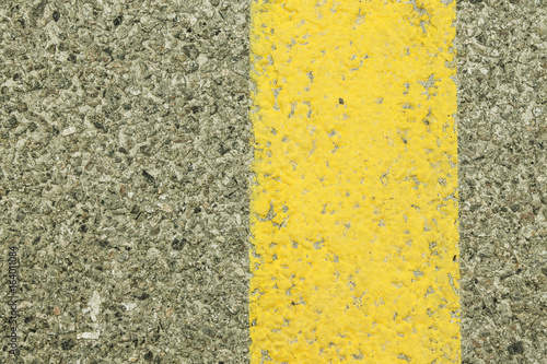 Strips on the asphalt. Background with a texture of asphalt.