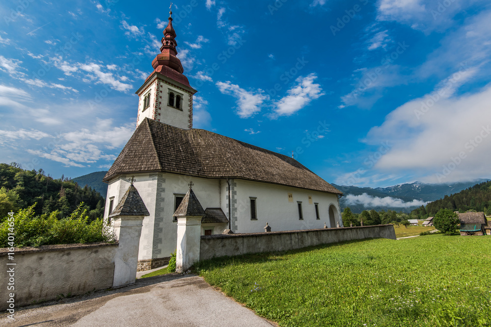 Bitnje Cerkev in Slovenia Triglav Park at summer day