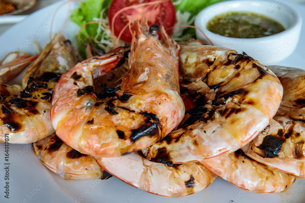 Burn shrimp or prawn served on plate. Burn shrimp or prawn served on plate.
