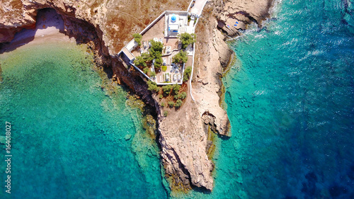 Aerial drone photo of small church of Agios Nikolaos and rocky seascape, Koufonissi island, small Cyclades, Aegean, Greece