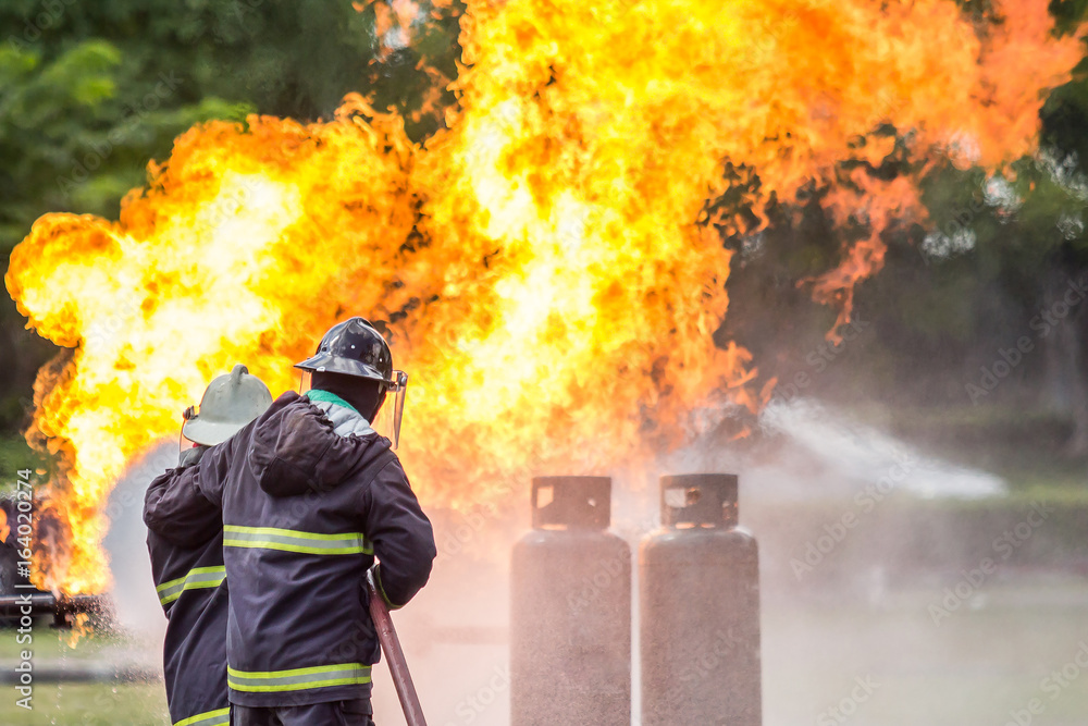 Firefighters are training for fighting with fire from gas.