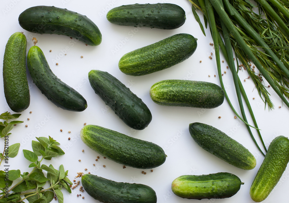 Flat lay with cucumbers and greenery Flat lay with cucumbers and greenery