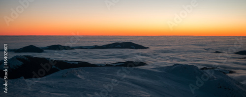 scenic sunrise, sunset in the winter mountains. mountain range © Roman