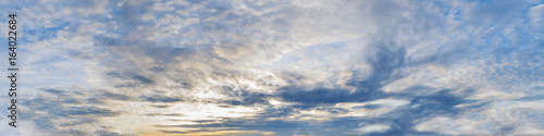 Fototapeta Naklejka Na Ścianę i Meble -  Vibrant color panoramic sun rise and sun set sky with cloud on a cloudy day. Beautiful cirrus cloud. Panorama high resolution photograph.