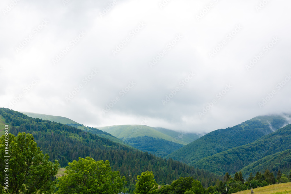 Photo of rainy clouds in Carpathian mountains