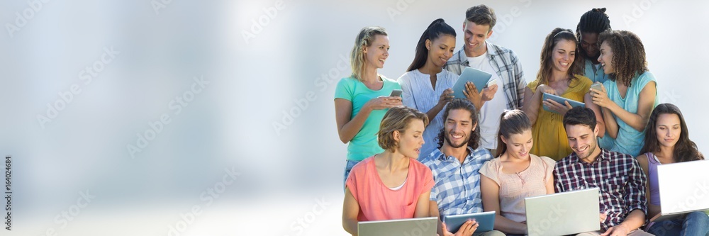 Group class of Students in front of blurred background Group class of Students in front of blurred background