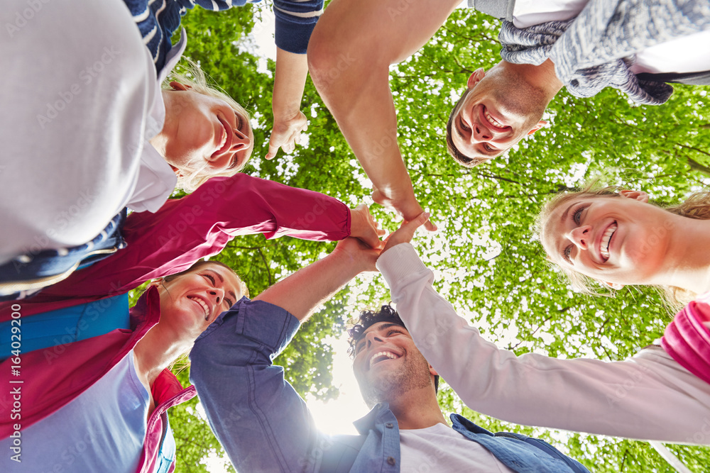 Gruppe Freunde beim High Five geben Stock Photo | Adobe Stock