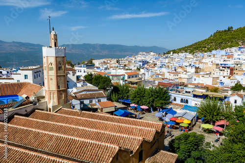 An overlook of Chefchaouen, Morocco with the medina and the Grand mosque © Deyan