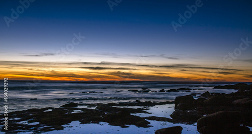 La Jolla tide pools at sunset with views of toned skies