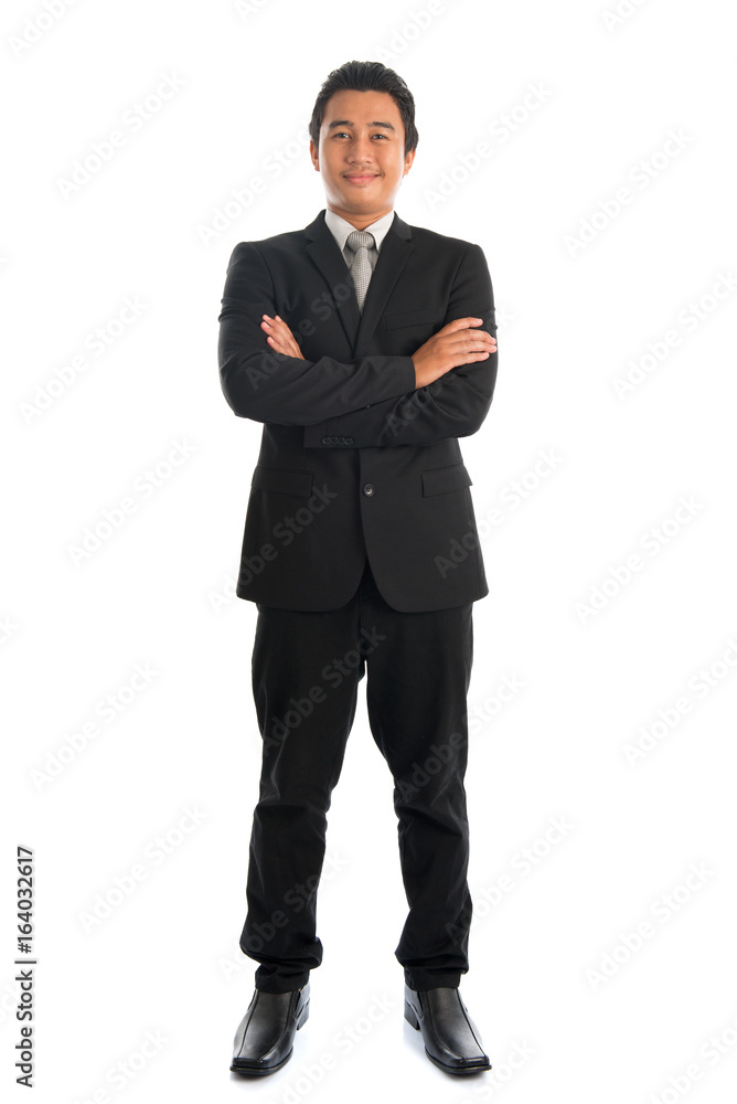 Obraz premium Full body Asian businessman arms crossed
