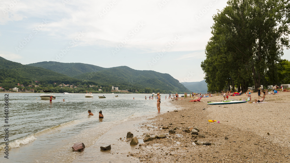 Fototapeta premium people enjoying summer on beach. life on beach in summer
