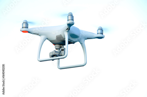 White drone quadrocopter with camera on blue sky background. 