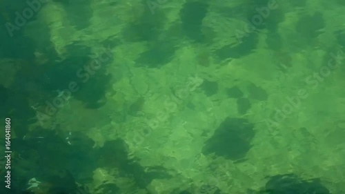  00:01 | 00:14 1×  Moving Water Surface with Stones under water