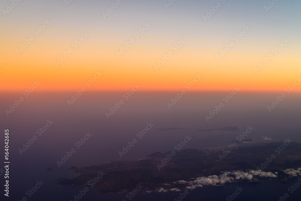 Aerial Photo Of Ocean Sunset Over Island