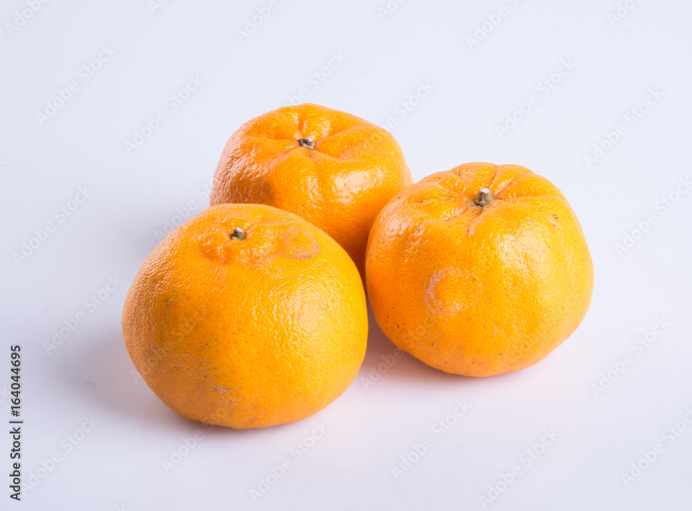 mandarin orange or clementine on the background. mandarin orange or clementine on the background.