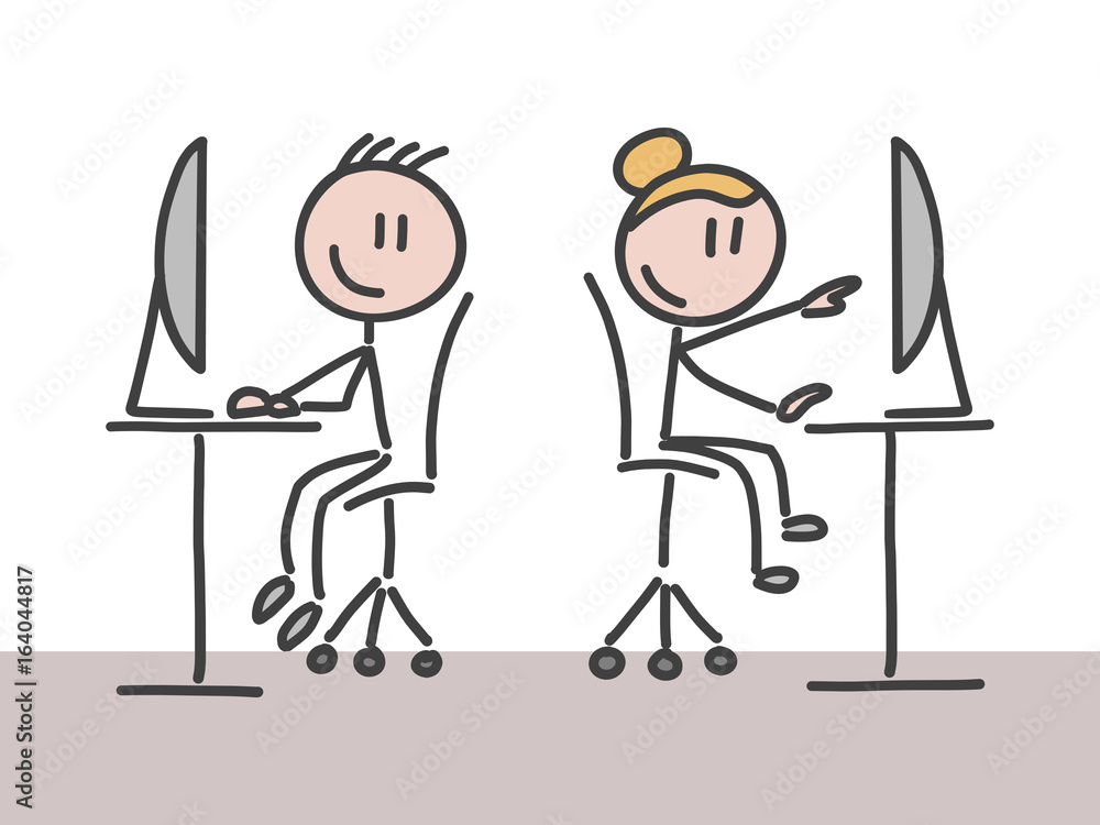 A man and a woman working in an office A man and a woman working in an office