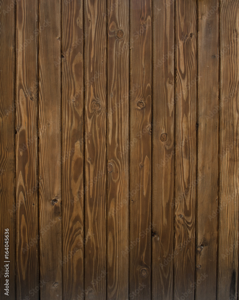 Brown wood wall as background.